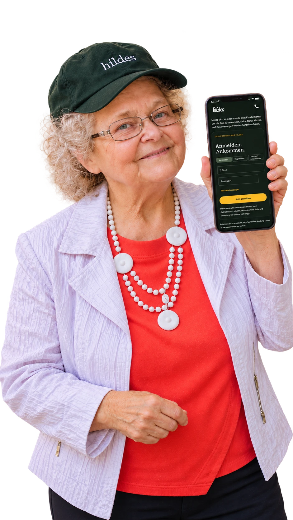 Unsere hildesCard-Botschafterin zeigt den hildes-Anmeldebildschirm auf ihrem Handy.